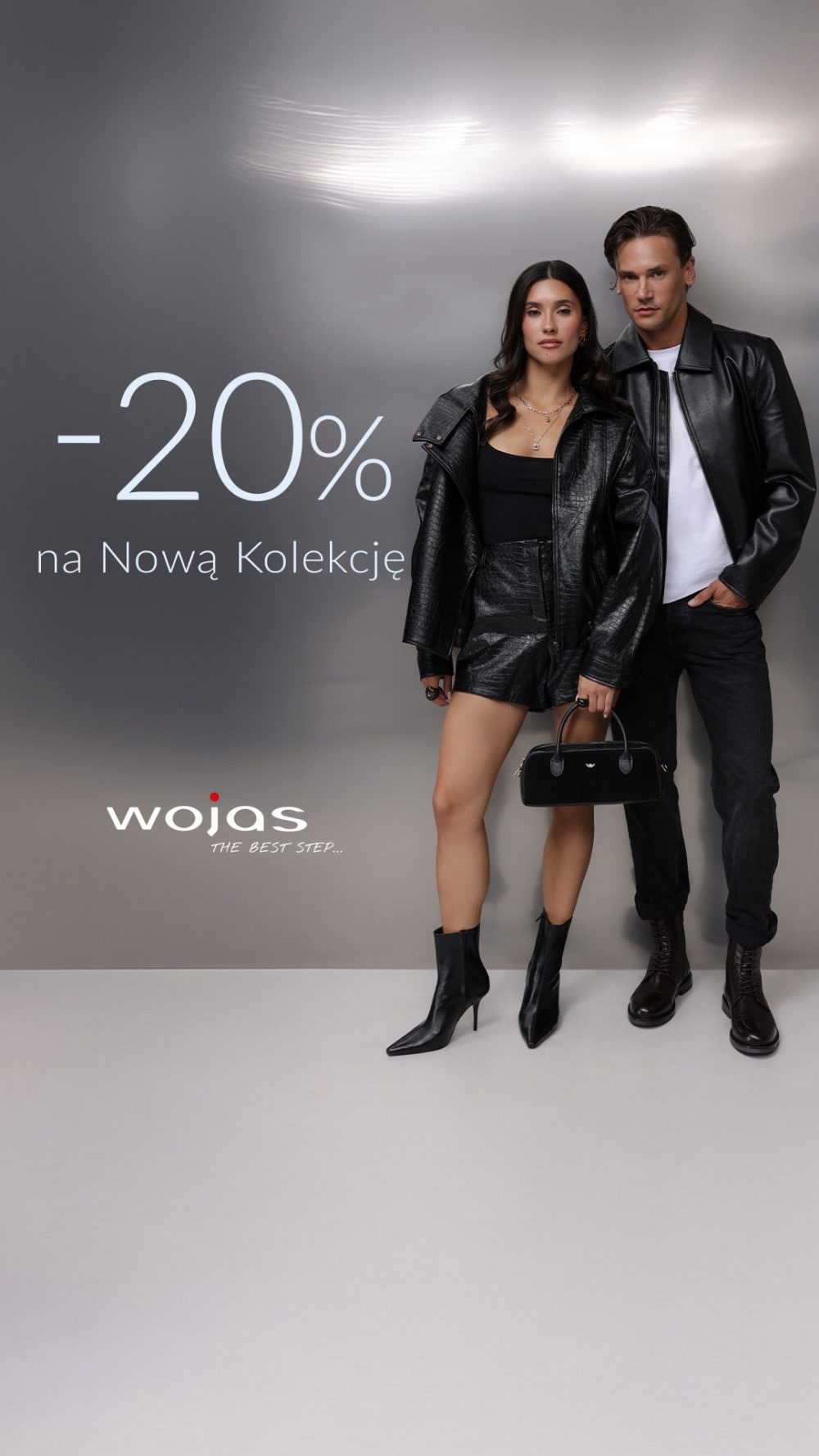 Grafika WOJAS: kobieta i mężczyzna w czarnych stylizacjach. Napis: „–20% na Nową Kolekcję”. Galeria Veneda